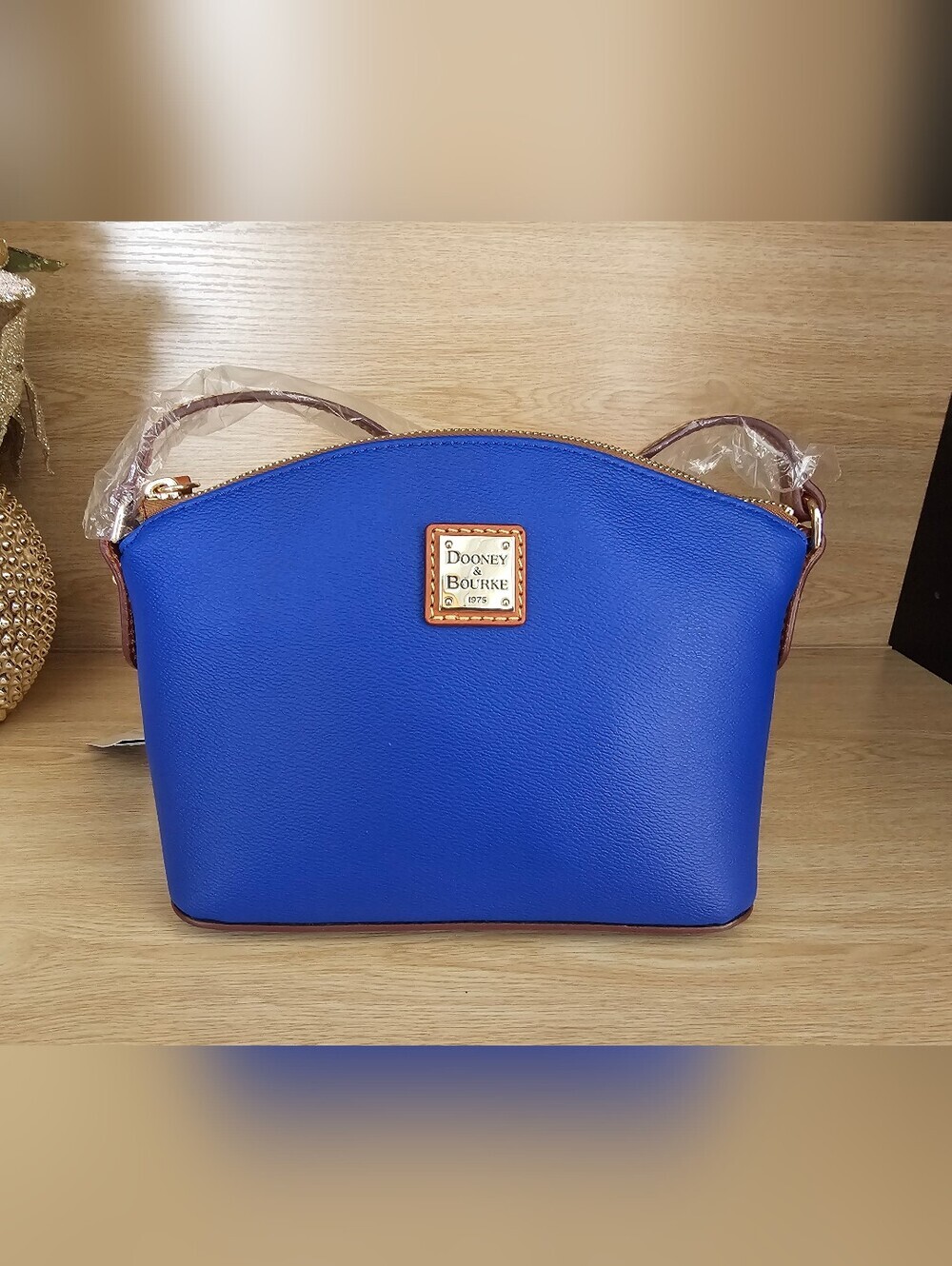 Dooney & Bourke Kirby Robin French Blue Crossbody Bag.